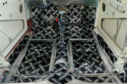 Dynamat shown on a Beetle floor surfaces